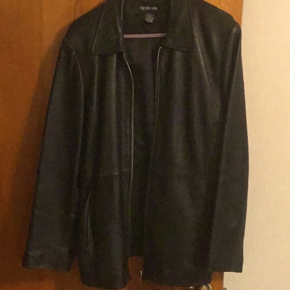 Black zip up leather lined jacket